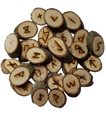 Oak rune set featuring the Elder Futhark burned onto slices of an Oak branch. Rune set comes with a black velveteen pouch.