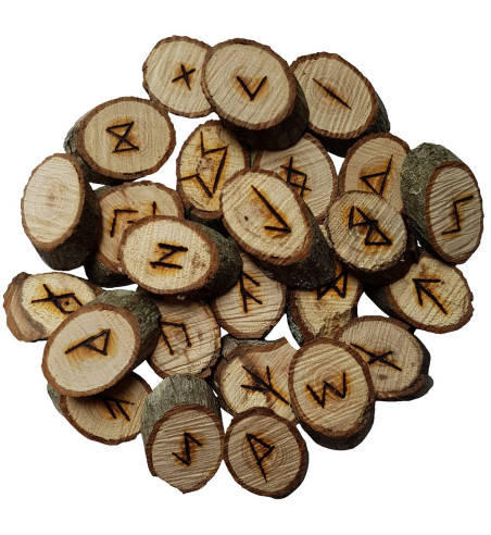 Oak rune set featuring the Elder Futhark burned onto slices of an Oak branch. Rune set comes with a black velveteen pouch.