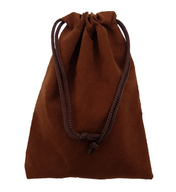 Brown colored drawstring velveteen bag shown closed holding a stone rune set.