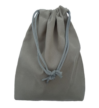 Grey colored drawstring velveteen bag shown closed holding a stone rune set.