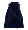 Navy blue colored drawstring velveteen bag shown closed holding a stone rune set.