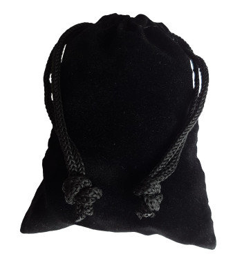 Small black colored drawstring velveteen bag shown closed holding a stone rune set.