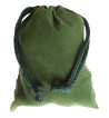 Small green colored drawstring velveteen bag shown closed holding a stone rune set.