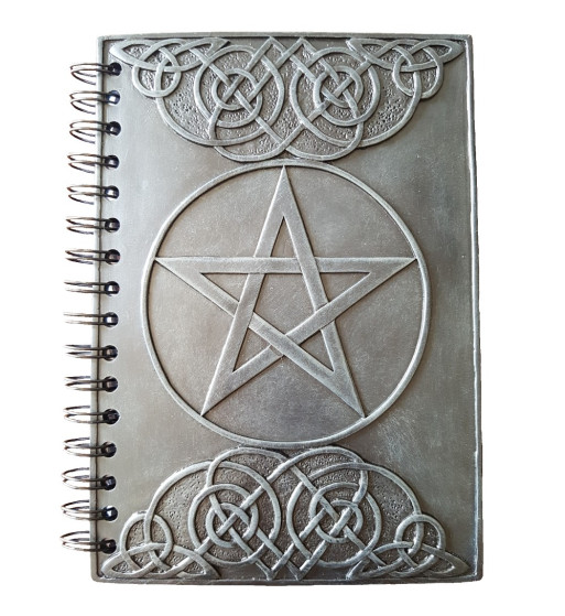 Hardcover Celtic knotwork journal made from resin with raised pentagram and Celtic knotwork design.