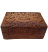 The Floral Triquetra Box is a wooden box with a carved floral pattern surrounding a triquetra.