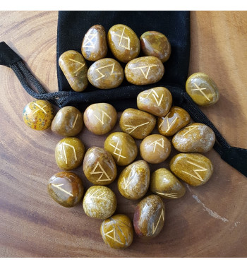 Tumbled smooth Camel Agate runes feature gold colored Elder Futhark runes and come with a black velveteen rune pouch.