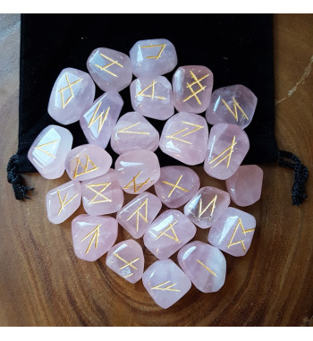 Large smooth Rose Quartz runes feature gold colored Elder Futhark runes and come with a black velveteen rune pouch.