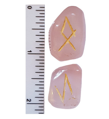 Large smooth Rose Quartz runes feature gold colored Elder Futhark runes and come with a black velveteen rune pouch.