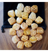 Peach Aventurine runes feature gold colored Elder Futhark runes.  All sets come with a black velveteen rune pouch.