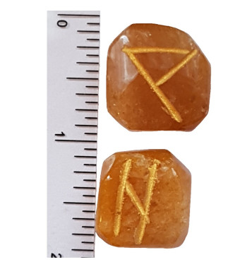 Peach Aventurine runes feature gold colored Elder Futhark runes.  All sets come with a black velveteen rune pouch.