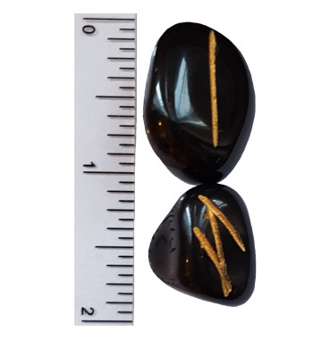 Black Jasper runes feature gold colored Elder Futhark runes.  Each set comes with a black velveteen rune pouch.