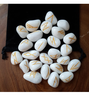 White Quartz Runes featuring golden Elder Futhark runes.  Each set comes with a black velveteen bag.