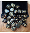 Rainbow Obsidian Runes feature golden colored Elder Futhark markings.  Each set comes with a black rune bag.