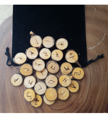 Maple rune set featuring the Elder Futhark burned onto slices of a Maple branch. Rune set comes with a black velveteen pouch.