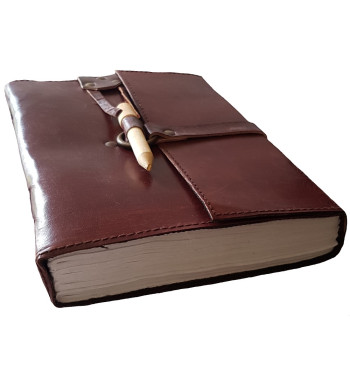 Brown leather medieval journal has a fold over cover with loop and wooden peg closure.