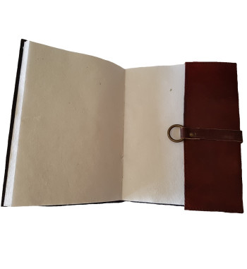 Brown leather medieval journal has a fold over cover with loop and wooden peg closure.