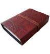 The front cover of the Sacred Oak Tree Leather Journal has an embossed tree and Celtic knotwork design.