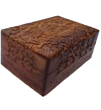 The Floral Triquetra Box is a wooden box with a carved floral pattern surrounding a triquetra.