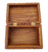 The Floral Triquetra Box is a wooden box with a carved floral pattern surrounding a triquetra.